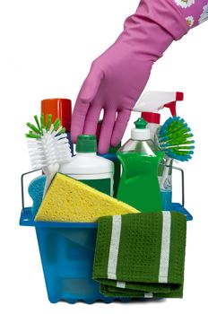Hand wearing colorful rubber latex glove reaching for cleaning supplies.  Isolated on white.