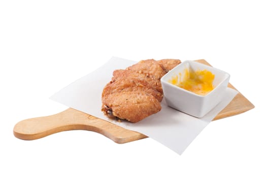 Deep fried chicken wings with various types of cheese for dipping isolated on white background with clipping path