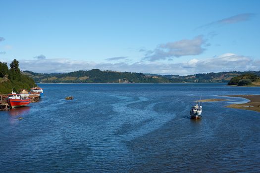 Fishing boats on the coast in Castro, capital of the Island of Chiloé in Chile.
