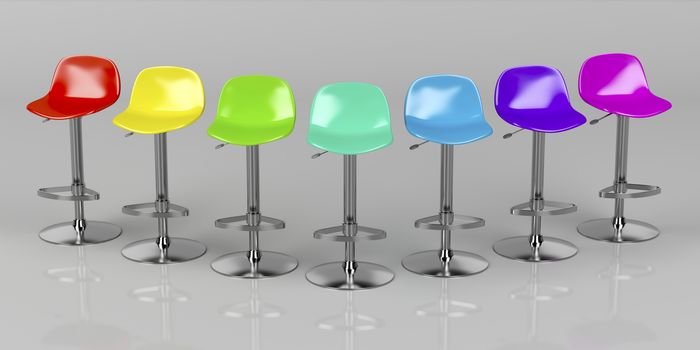Unique colorful bar stools on shiny gray background, front view 