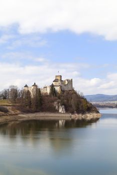 XIV century Niedzica Castle on the lake Czorsztyn on a  sunny day,  Poland, Europe

