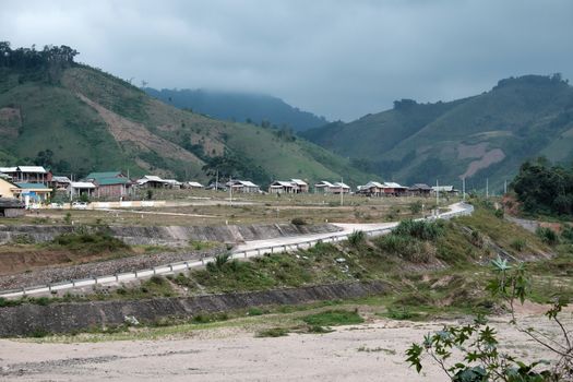 Group of house in ethnic minority residence at Quang Nam village, along Ho Chi Minh trail, houses on mountain terrain, stay seperation in fresh air, green scene on day