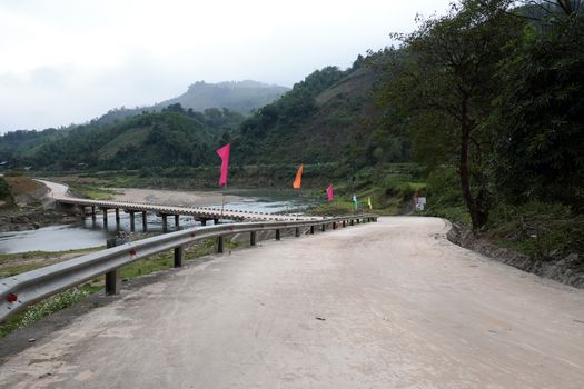 Group of house in ethnic minority residence at Quang Nam village, along Ho Chi Minh trail, houses on mountain terrain, stay seperation in fresh air, green scene on day