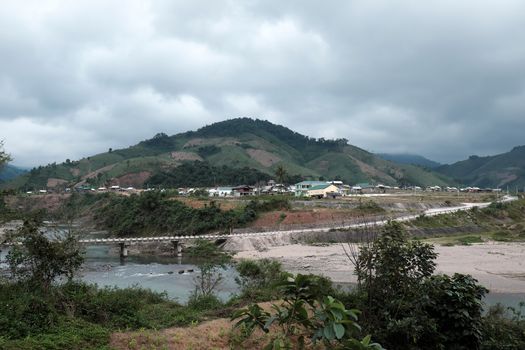 Group of house in ethnic minority residence at Quang Nam village, along Ho Chi Minh trail, houses on mountain terrain, stay seperation in fresh air, green scene on day