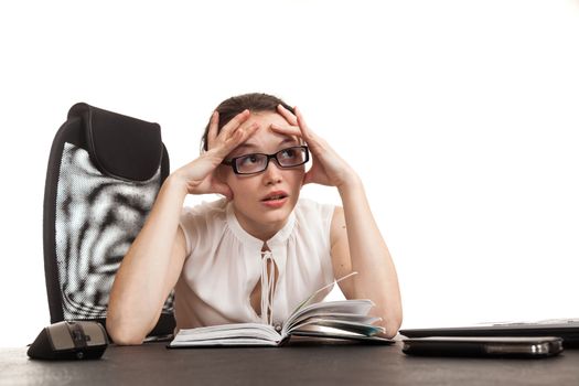 the business woman sits at office table with the laptop