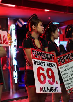 PATTAYA, THAILAND - DECEMBER 13: Nightlife on walking street on December 13, 2013 in Pattaya.