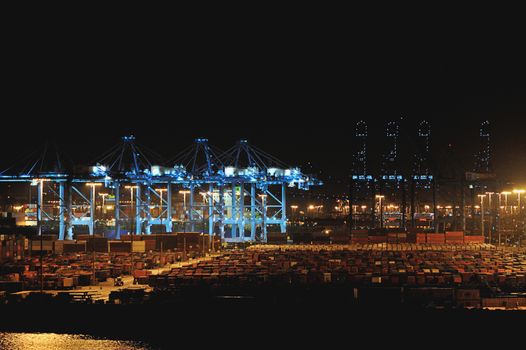 containers  in warehouse port at night light