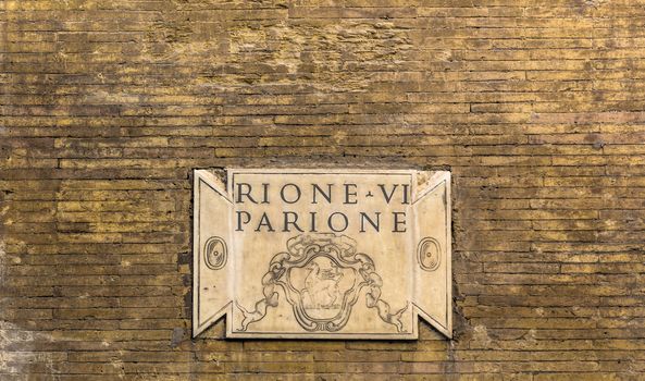 The plate that indicates the name of medieval district of Rome. In this case there is the district number six called Parione (big wall)