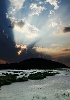 rays on sky over Khwae Yai river which is in Thailand