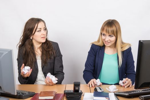 Angered, disgruntled employee office crumple the paper