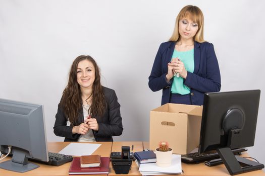 The dismissal of colleagues is joy in the office employee