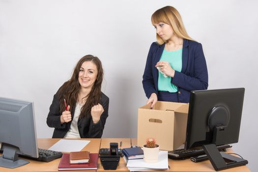 Office worker rejoices that dismissed colleague collects things