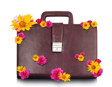 Brown suitcase with flowers isolated on white background