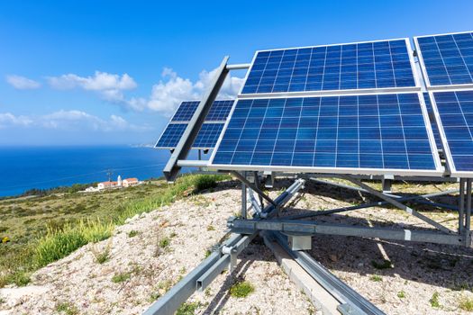 Blue solar panels at coast near sea in Kefalonia Greece