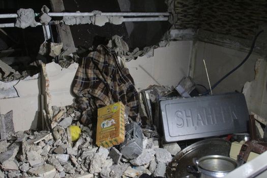 WEST BANK, Hebron: Relatives inspect the heavily damaged interior of the home of Ihab Maswada, a Palestinian man accused of stabbing an Israeli man, Genadi Kaufman,  after it was destroyed by Israeli authorities in Hebron, West Bank, on March 31, 2016. Kaufman was murdered near the Cave of the Patriarchs in Hebron on December 7, 2015. Maswada was shot dead by security forces at the scene.