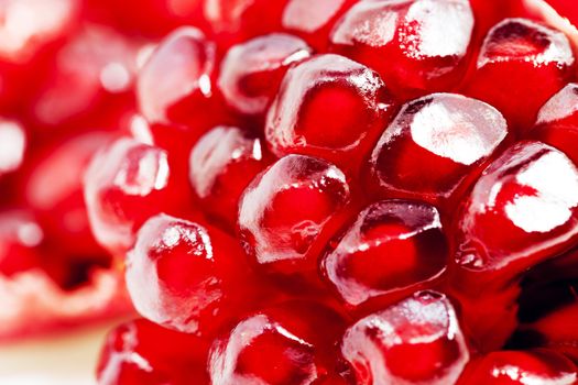  photographed close up ripe red pomegranate seeds