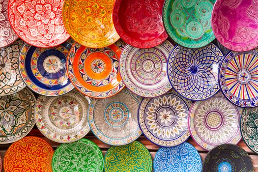 Traditional arabic handcrafted, colorful decorated plates shot at the market in Marrakesh, Morocco, Africa.