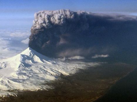 UNITED STATES, Aleutian Islands: Pavlof Volcano on Aleutian Islands chain sends ash plume in to the air on March 27, 2016. The photo was taken by a passenger of a flight out of Dutch Harbor airport. The ash plume is around 37,000 feet high and trails some 400 miles to the northeast over the Alaskan interior. Aviation alerts were up in the region.