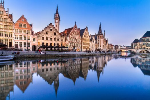 Picturesque medieval buildings overlooking the "Graslei harbor" on Leie river in Ghent town, Belgium, Europe.