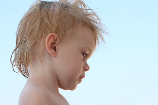 Portrait of cute baby girl with wet hair