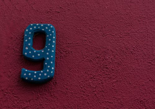 Funny number 9 on a house wall