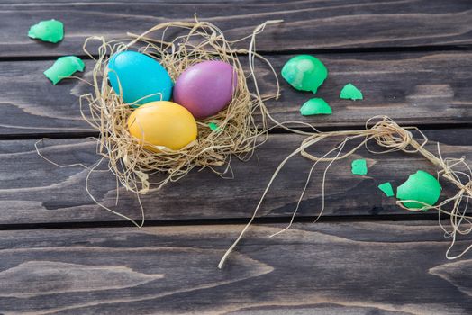 Easter Composition with chicken Eggs on the Warm Wooden Background. 