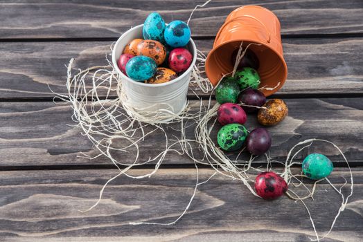 Easter. Painted Eggs on Easter table. Easter Egg in the Basket. Easter Decoration
