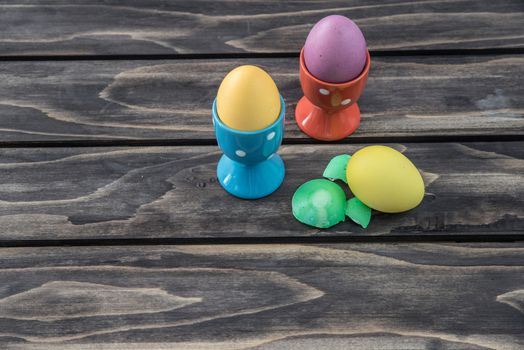 Easter Painted Eggs on wooden bacground