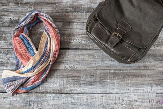 Vintage still life of random objects of modern woman on wooden board