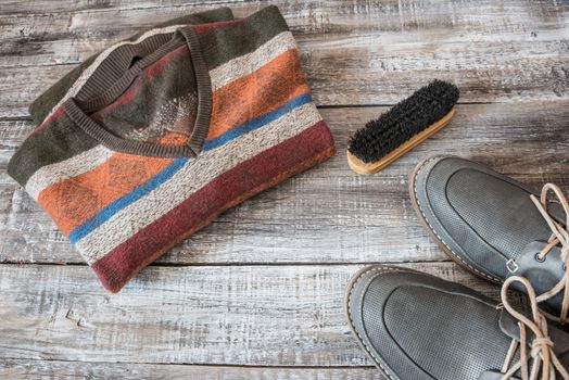 Travel, vacation concept of random men objects on wooden background