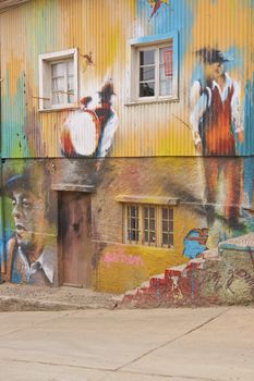 Colourful murals decorating the walls of buildings in the historic port city of Valparaiso in Chile.