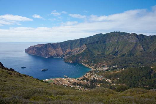 Panoramic view of Cumberland Bay and the town of San Juan Bautista on Robinson Crusoe Island, one of three main islands making up the Juan Fernandez Islands some 400 miles off the coast of Chile.