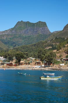 Panoramic view of Cumberland Bay looking towards the small town of San Juan Bautista on Robinson Crusoe Island, one of three main islands making up the Juan Fernandez Islands some 400 miles off the coast of Chile.