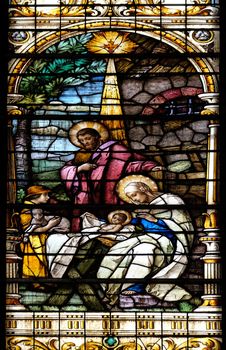 Nativity Scene, Birth of Jesus, stained glass window in the Basilica of the Sacred Heart of Jesus in Zagreb, Croatia