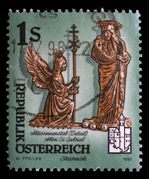 Stamp printed by Austria, shows figures of archangel Gabriel and Virgin Mary, The Annunciation, Monastery of Admont, circa 1995