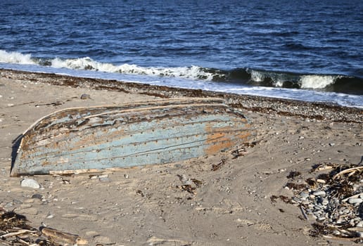 Old abandoned boat on a shore of White sea