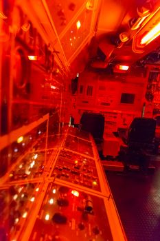 control room closeup , red light modern electronic technology background
