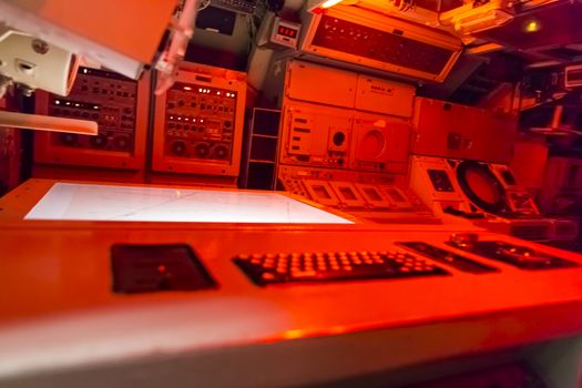 control room closeup , red light modern electronic technology background