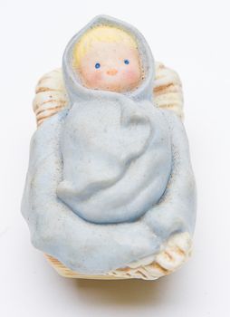 vintage figure of a baby jesus of the christmas nativity scene