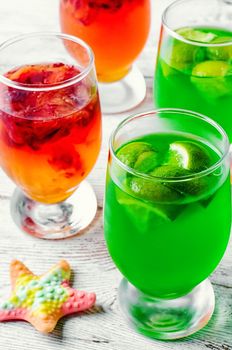 glass of sweet milk and honey drinks with kiwi and oranges