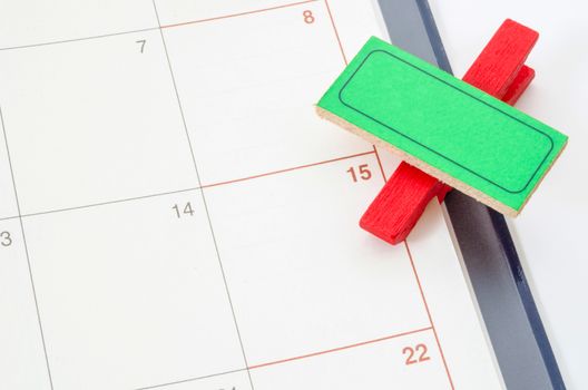 Blank wood clip Tag for your text on schedule, calendar.