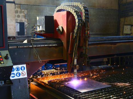 Industrial cnc plasma cutting of metal plate