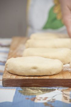 Several small patties with the potato filling