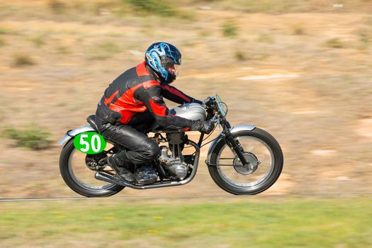 BROADFORD, VICTORIA/AUSTRALIA - APRIL 1, 2016: Classic bikes practice at Broadford Racetrack before the 2016 Shannons Victorian Historic Road Racing Championship.