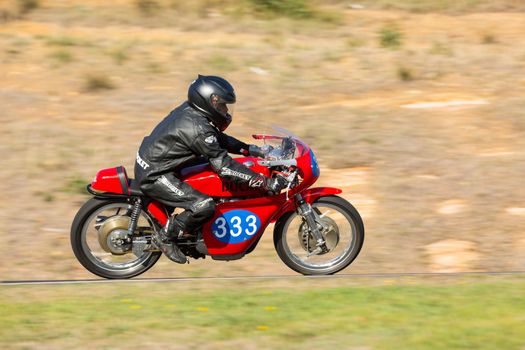 BROADFORD, VICTORIA/AUSTRALIA - APRIL 1, 2016: Classic bikes practice at Broadford Racetrack before the 2016 Shannons Victorian Historic Road Racing Championship.