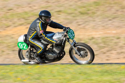 BROADFORD, VICTORIA/AUSTRALIA - APRIL 1, 2016: Classic bikes practice at Broadford Racetrack before the 2016 Shannons Victorian Historic Road Racing Championship.