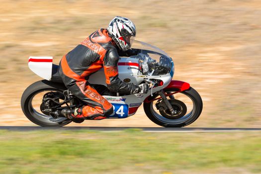 BROADFORD, VICTORIA/AUSTRALIA - APRIL 1, 2016: Classic bikes practice at Broadford Racetrack before the 2016 Shannons Victorian Historic Road Racing Championship.