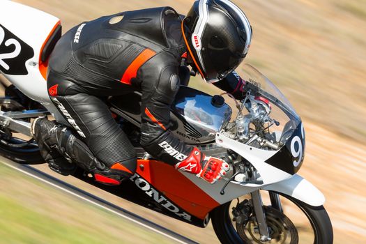 BROADFORD, VICTORIA/AUSTRALIA - APRIL 1, 2016: Classic bikes practice at Broadford Racetrack before the 2016 Shannons Victorian Historic Road Racing Championship.