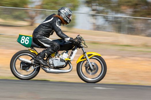 BROADFORD, VICTORIA/AUSTRALIA - APRIL 1, 2016: Classic bikes practice at Broadford Racetrack before the 2016 Shannons Victorian Historic Road Racing Championship.