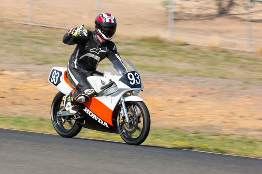 BROADFORD, VICTORIA/AUSTRALIA - APRIL 1, 2016: Classic bikes practice at Broadford Racetrack before the 2016 Shannons Victorian Historic Road Racing Championship.